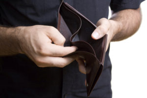 Man showing empty wallet