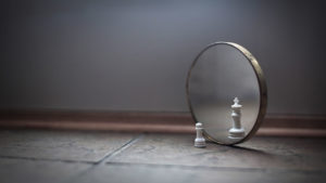 pawn-reflecting-in-a-mirror-as-a-king