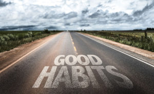Good Habits written on rural road